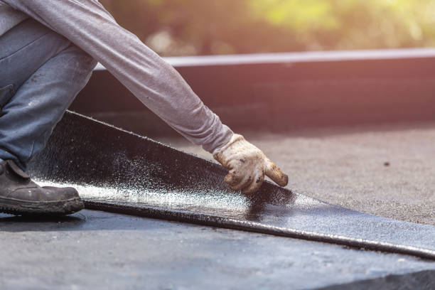 Professional Basement Waterproofing technician working in Strathmore, NJ